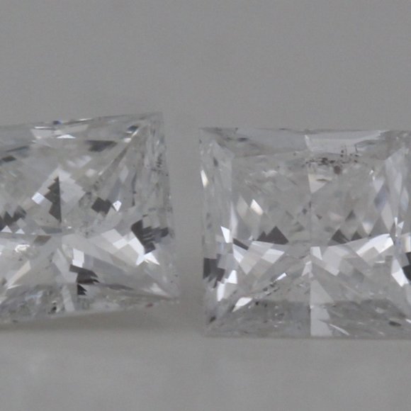 A Pair Of Princess Loose Diamonds (0.63 Ct F I1 ) C4371
